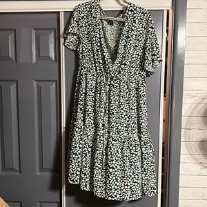 Green and white dress from the Shane curve collection